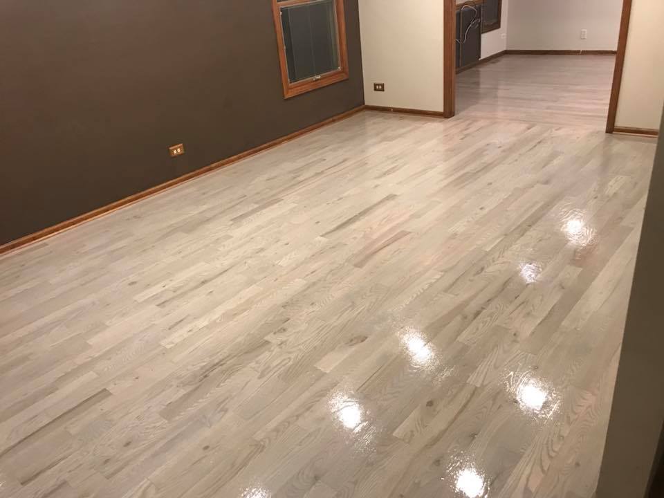 Finished light wood flooring in a Gomas Flooring project